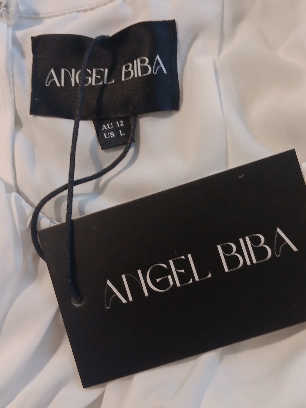Angel Biba Off Shoulder Short Sleeved Tiered Romper With Ties - Picture 8 of 11